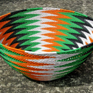The basket I have donated to Animals Asia in a chevron pattern of black, white, green and orange wires.