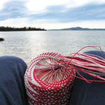 A rather blurry picture of my outlook from my weaving spot. The basket is in focus but the seascape in the background isn't.