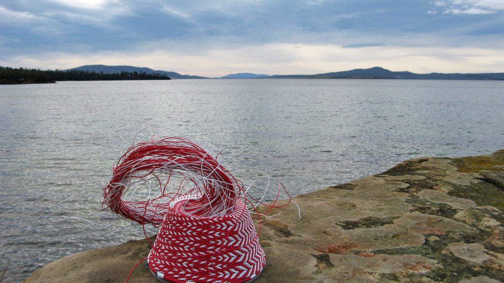 Telephone wire basket on a rock at Plunkett Point on the Tasman Peninsula.
